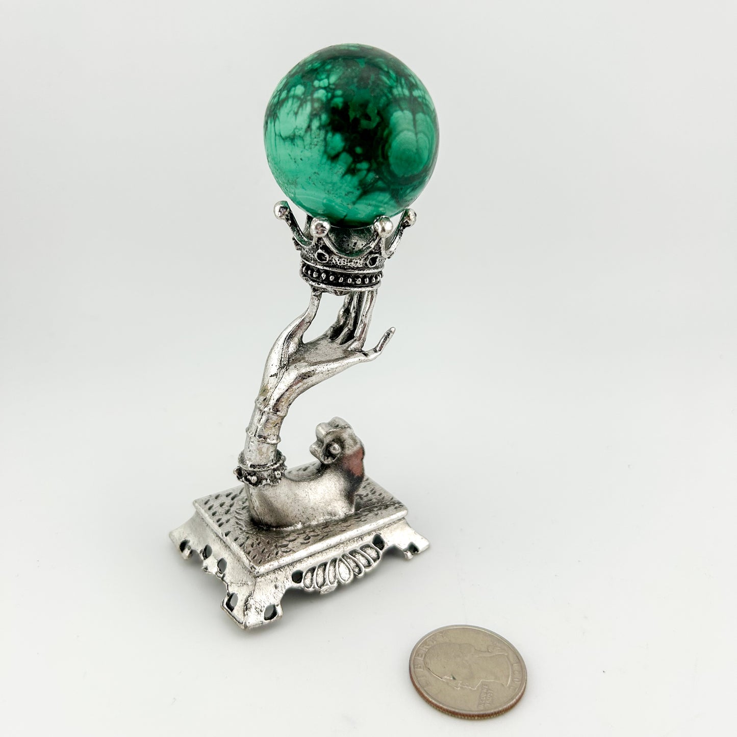 Hand and Crown Sphere Holder